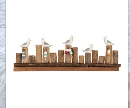 Seagulls on Groyne with bouys